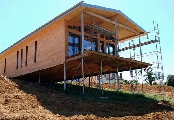 Как утеплить свайный фундамент деревянного дома?